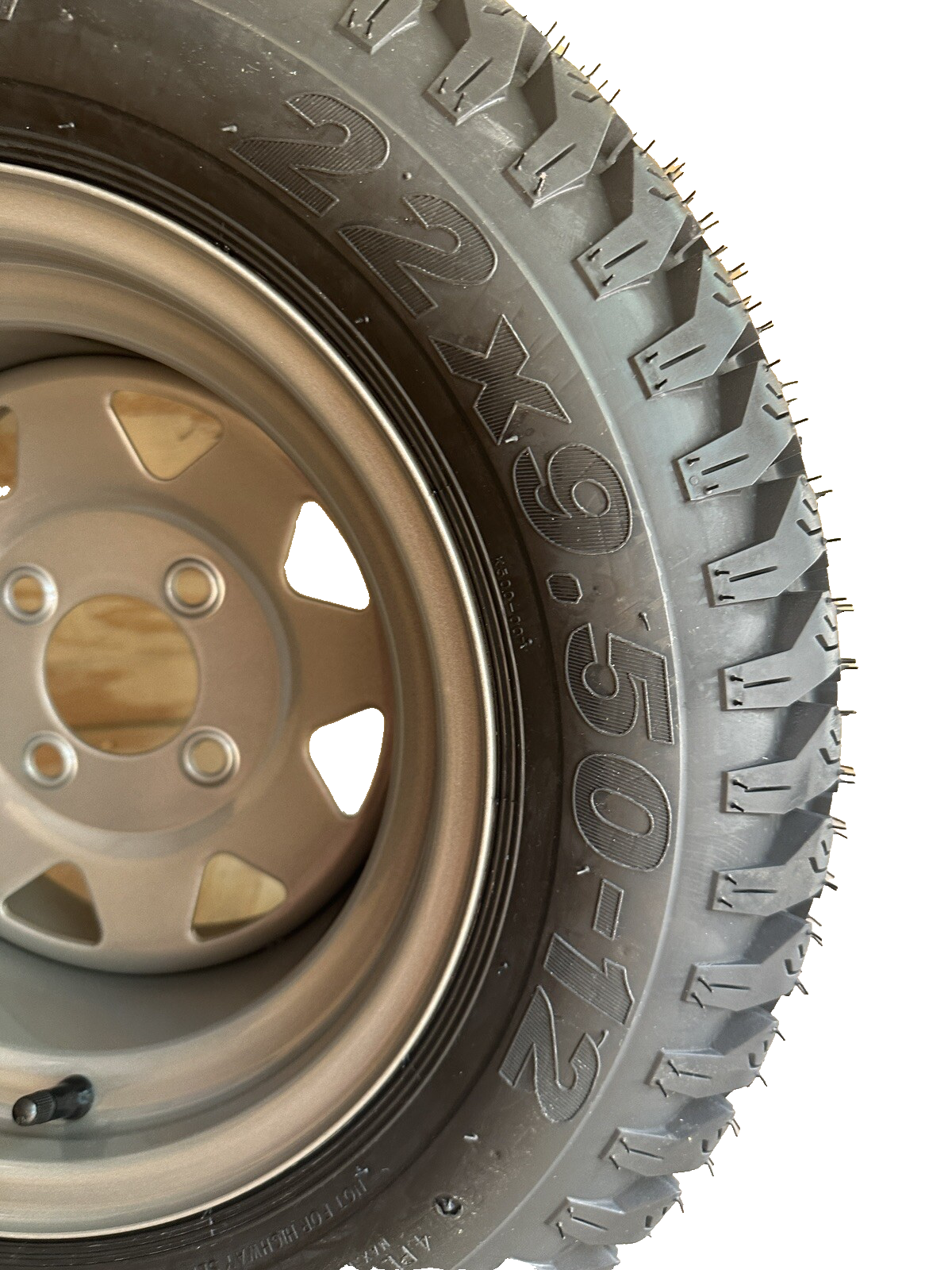 TORO LAWNBOY 126-3280 WHEEL AND TIRE ASSEMBLY 22 x 9.50 - 12 NHS 4 LUG